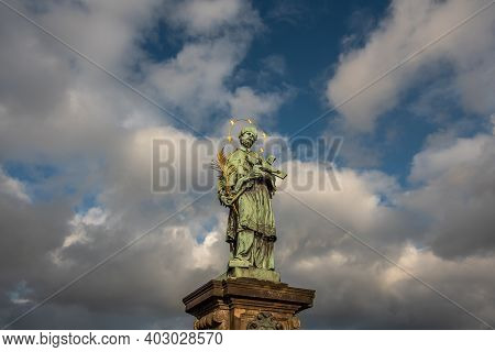 Prague, Czech Republic. 01-11-2021. Statue Of John Of Nepomuk On Charles Bridge By Mathias Rauchmull