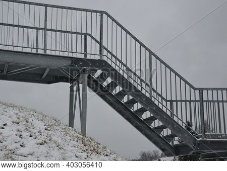 Gray Snow-covered Staircase Observation Deck Construction With High Resistance To Deformation Even U