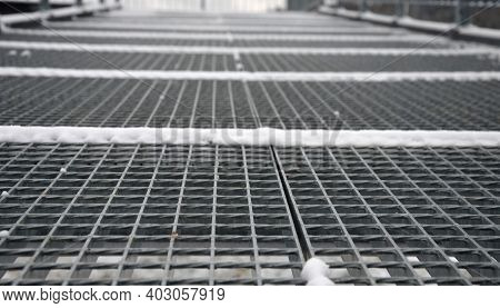 Gray Snow-covered Staircase Observation Deck Construction With High Resistance To Deformation Even U