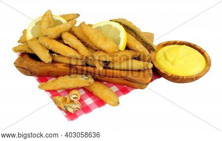 Fried Bread Crumb Covered Whitebait Fish With Mayonnaise Dip In An Olive Wood Dish Isolated On A Whi