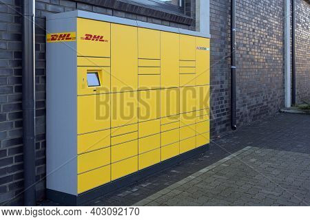 Ratzeburg, Germany, January 12, 2021: Dhl Packstation With Boxes Where Customers Can Send And Pick U