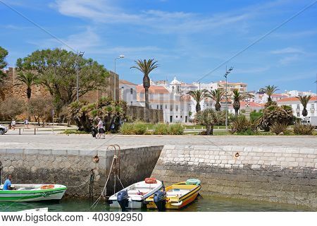 Lagos, Portugal - June 9, 2017 - Small Boats Moored Along The River Bensafrim With The Governors Pal