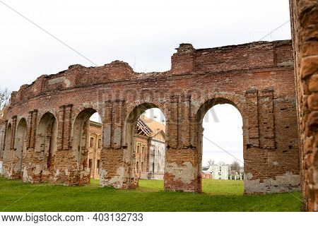 Ruzhansky Palace And The Ruins Of The Facade Of An Abandoned Ruined Building Of An Ancient Castle Of
