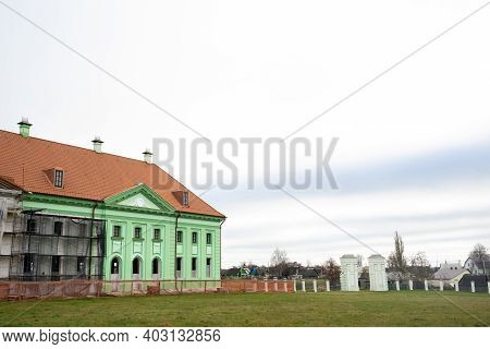 Ruzhansky Palace And The Ruins Of The Facade Of An Abandoned Ruined Building Of An Ancient Castle Of