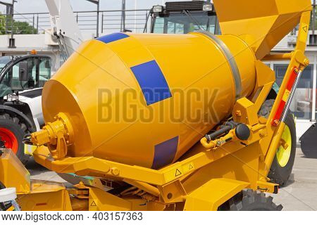 Self Loading Cement Mixer Vehicle At Construction Site