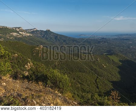 Aerial View Of Green Landscape Of Supramonte Mountains With Baunei And Arbatax Village, Limestone Ro