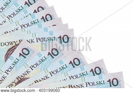 10 Polish Zloty Bills Lies Isolated On White Background With Copy Space Stacked In Fan Close Up. Pay