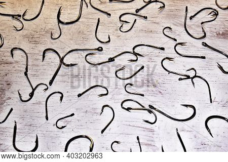 Picture On White Background Full Of Fishing Hooks