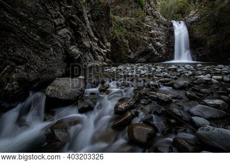 Waterfall Splashing And Flowing Through Stones On The River. Machairas Forest Troodos Mountains Cypr