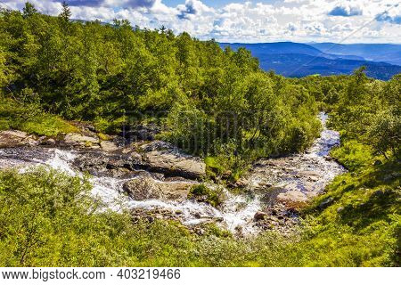 Running Water Of A Small Beautiful Waterfall River, Vang, Norway.