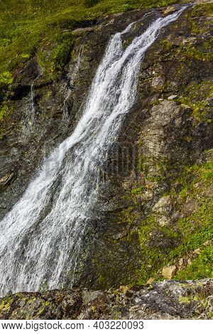 Running Water Of A Beautiful Waterfall River, Vang, Norway.