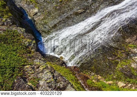Running Water Of A Beautiful Waterfall River, Vang, Norway.