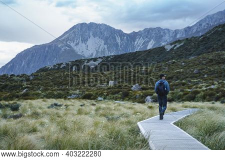 Man Doing Hooker Valley Track. Mount Cook, Aoraki National Park. New Zealand.