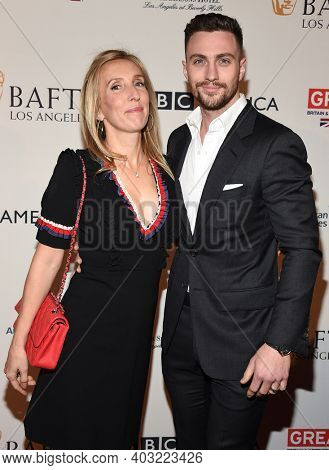 LOS ANGELES - JAN 7:  Aaron Taylor-Johnson and Sam Taylor-Johnson arrives for  BAFTA Los Angeles Tea Party 2017 on January 07, 2017 in Beverly Hills, CA