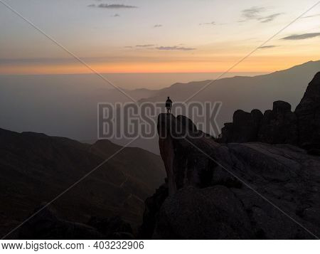 Sunset Panorama Hiker Poncho On Marcahuasi Andes Plateau Rock Formations Mountain Hill Valley Nature