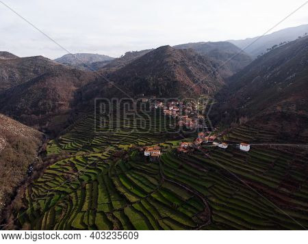 Aerial Panorama Of Green Agriculture Farming Terraces Old Remote Rural Mountain Village Town Porta C