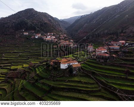 Aerial Panorama Of Green Agriculture Farming Terraces Old Remote Rural Mountain Village Town Porta C