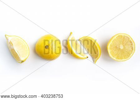 Isolated Lemons. Collection Of Whole And Sliced Lemons Isolated On White Background