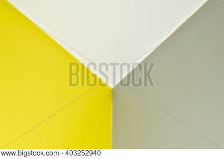 Abstract Graphic Background In Yellow And Gray Colors. Straight Lines On The Wall, Corner With Three