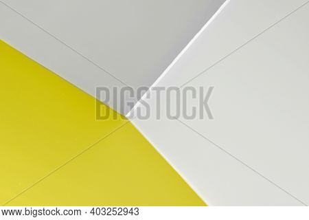Abstract Graphic Background In Yellow And Gray Colors. Straight Lines On The Wall, Corner With Three