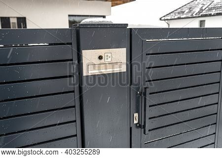 A Modern Videophone With A Letterbox And A Wireless Card Reader, Mounted In Panel Fence In Anthracit
