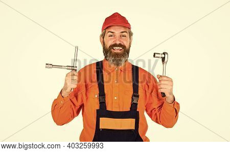 Used To Unwind Or Tighten Nuts And Bolts. Happy Man Worker. Knowing How To Change Tire Is Necessary 