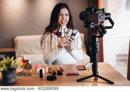 Beauty Blogger Copycat Female Filming Daily Make-up Routine Tutorial On Camera. Influencer Young Wom