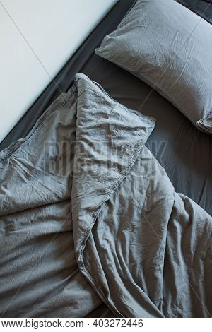 Blue Bed Sheets And Pillows After Night's Sleep.