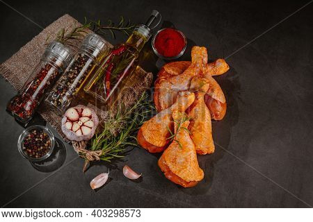 Top View.convenience Food,pree Cooked.marinated Chicken Drumstick Black Background Raw Chicken Meat 