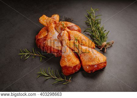 Top View.convenience Food,pree Cooked.marinated Chicken Drumstick Black Background Raw Chicken Meat 