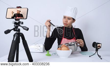 Food Blogger. Asian Woman Chef Streaming Live.