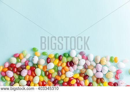 Happy Easter Concept. Preparation For Holiday. Easter Candy Chocolate Eggs And Jellybean Sweets Isol