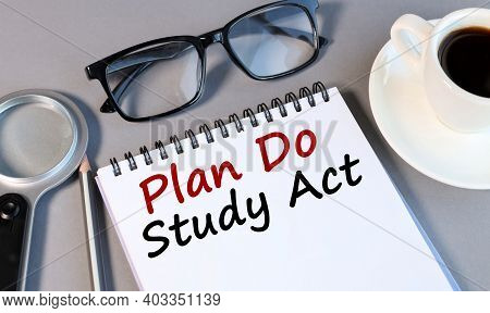 Plan Do Study Act. Text On White Paper On Gray Background.