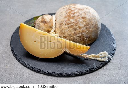 Italian Semi Hard Matured Caciocavallo Cheese, Handmade And Aged In Natural Underground Caves In Apu