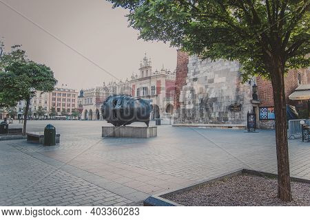 Krakow, Poland - October, 2015: Giant Bronze Head In Main Market Square Of Krakow. This Sculpture, N