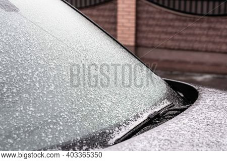 Icy Car, Ice Scraping. Car In Ice, Winter Frozen. Slippery Road, Ice.