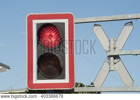 Ungated Railroad Crossing With Level Crossing Sign