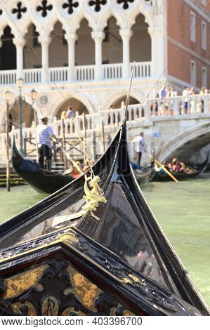Gondola In A Canal Of Venice, Italy