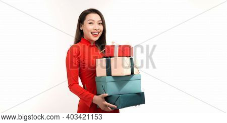 Woman In Vietnamese Tranditional Costume Hold With Gift Box