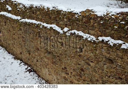 High Fortification Wall Of The Old Castle With Openings Along The Gallery And The Floor Of Beams. Sn