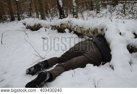 Dead Man Covered With A Tree. The Tree Turned Upside Down And Killed, Fell On A Tourist, A Forest Wo