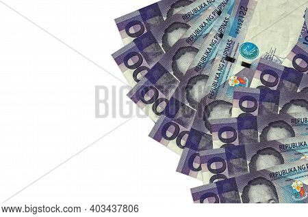 100 Philippine Piso Bills Lies Isolated On White Background With Copy Space. Rich Life Conceptual Ba