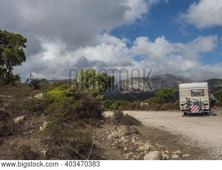 Ogliastra, Sardinia, Italy, September 11, 2020: Camper Van Standing At Country Dirt Road At Supramon