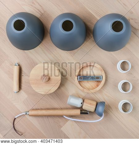 Assembling Furniture At Home. Self-assembly Of The Chandelier. Details Of The Luster Laid Out On The