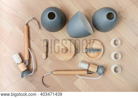 Assembling Furniture At Home. Self-assembly Of The Chandelier. Details Of The Luster Laid Out On The