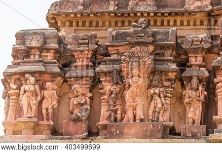 Hampi, Karnataka, India - November 5, 2013: Vijaya Vitthala Temple. Closeup Of  Statues Row On Red S