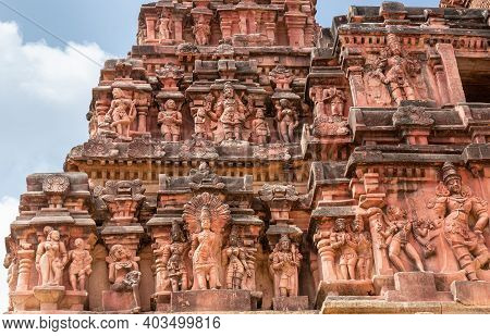 Hampi, Karnataka, India - November 5, 2013: Vijaya Vitthala Temple. Closeup Of 3 Statues Rows On Red