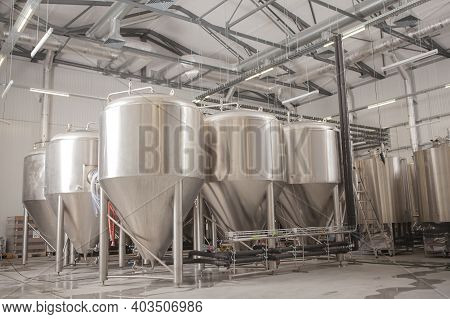 Rows Of Metal Beer Tanks At Microbrewery, Copy Space