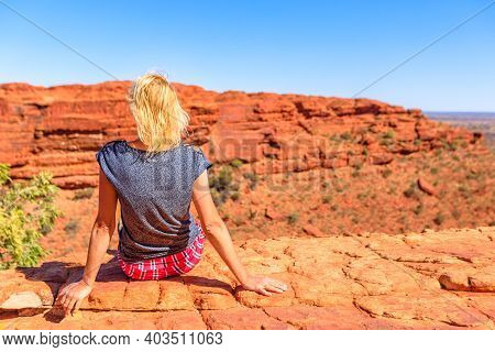 Caucasian Woman Looking Panoramic Views Of Kings Canyon In Watarrka National Park, Australias Red Ce