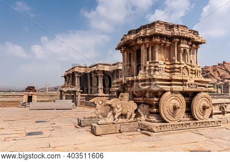 Hampi, Karnataka, India - November 5, 2013: Vijaya Vitthala Temple. Front And Side Of Brown Stone Ch